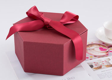 Dimensioni stampata abitudine 24,5 * 21,3 * 10.5cm dei contenitori di regalo di esagono con il nastro fornitore