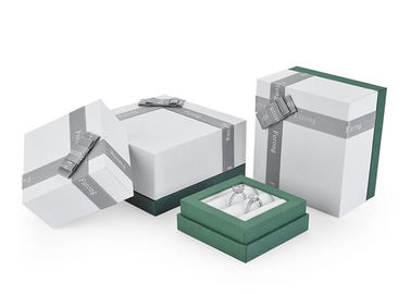 I contenitori d'imballaggio/abitudine di regalo di lusso elegante hanno stampato il materiale del cartone dei contenitori di gioielli fornitore
