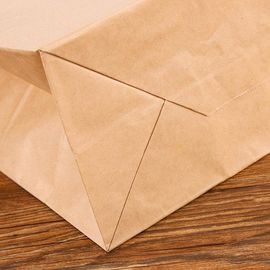 Corda piana rispettosa dell'ambiente della mano dei sacchi di carta di Kraft stampata abitudine fornitore