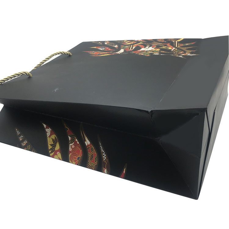 Materiale nero del cartone di colore delle borse di distributore di giornali della maniglia del nastro grande fornitore