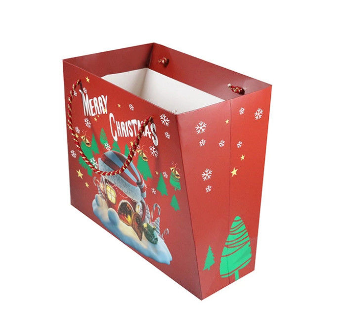 La dimensione su misura ha personalizzato il materiale stampato della carta patinata delle borse del regalo per il Natale fornitore